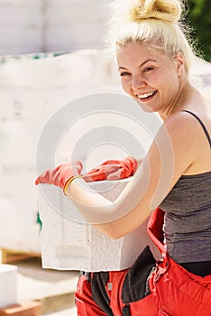 Woman working with airbricks