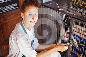 Woman working in animal shelter