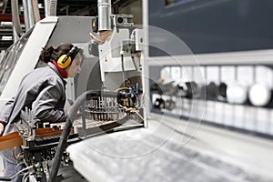 Woman working in automated factory