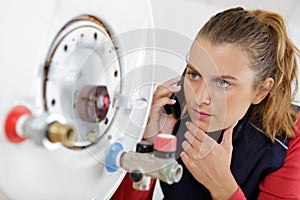 Woman working with boiler