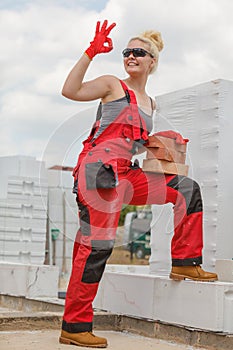 Woman working with bricks