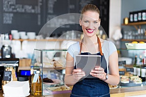 Woman working at cafe