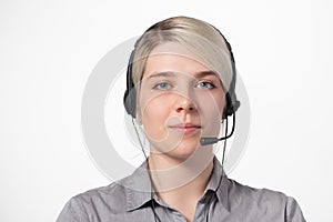 Woman working at call center calling with smile  over white background with large area for your text