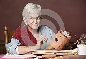 Woman working with clay