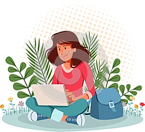 Woman working with computer in the graden.