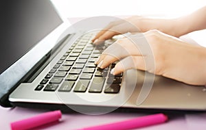 Woman working on computer in office