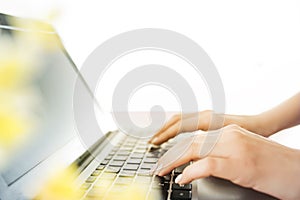 Woman working on computer in office