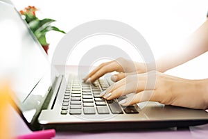 Woman working on computer in office