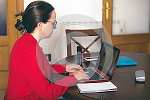 Woman working with computer photo