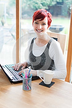 Woman working at contemporary home