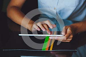 Woman working on digital tablet