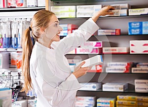 Woman working in farmacy photo