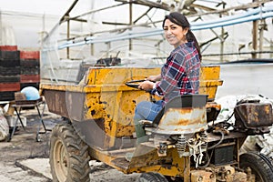 woman working on Forklift loader