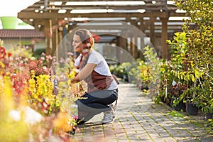 Woman working in garden center