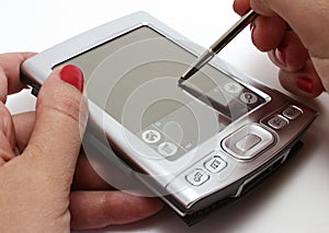 Woman working with her palmtop