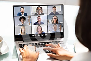 Woman Working From Home Having Group Videoconference