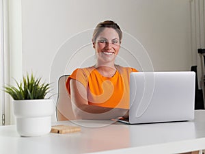 woman working at home with laptop