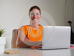 woman working at home with laptop