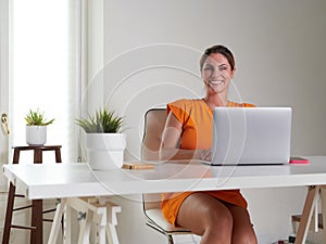 woman working at home with laptop