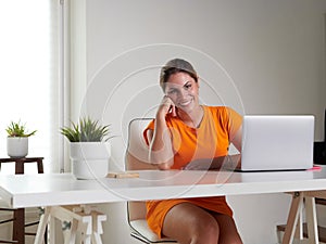 woman working at home with laptop