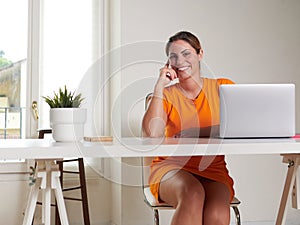 woman working at home with laptop