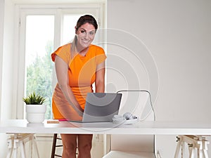 woman working at home with laptop