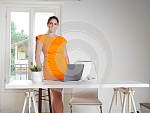 woman working at home with laptop