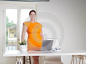 woman working at home with laptop