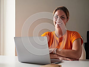 woman working at home with laptop