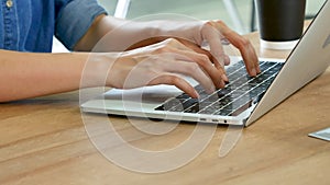 Woman working from home on laptop online meeting in home office. Entrepreneur asian business woman using notebook laptop sit on so