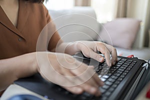 Woman working from home using her laptop