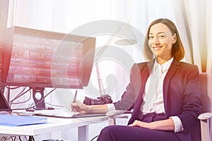 Woman working with image editor in the office