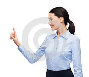 Woman working with imaginary virtual screen