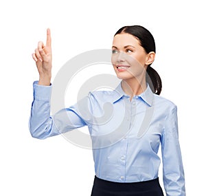 Woman working with imaginary virtual screen