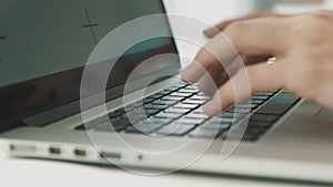 Woman working on laptop at home interier