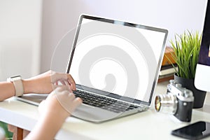 Woman working with laptop in office