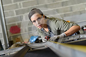 Woman working in metal industry