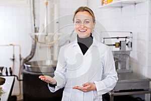 Woman working in modern food factory
