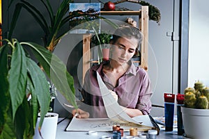 Woman working modern work place in art studio