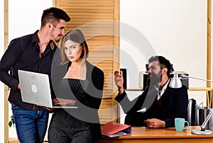 Woman working in mostly male workplace. Woman attractive lady working with men. Office collective concept. Sexual