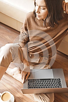 Woman working at notebook