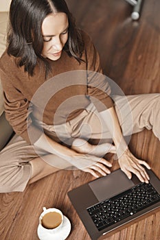 Woman working at notebook