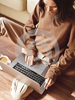 Woman working at notebook