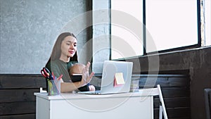 Woman working at office with her child