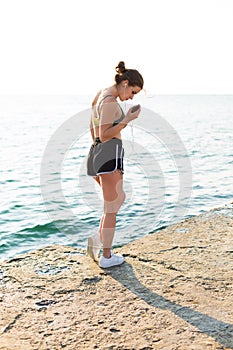 Woman working out at the beach