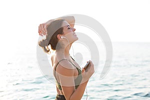 Woman working out at the beach