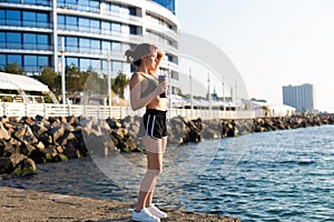 Woman working out at the beach