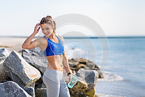 Woman working out at the beach