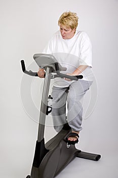 Woman working out on bike
