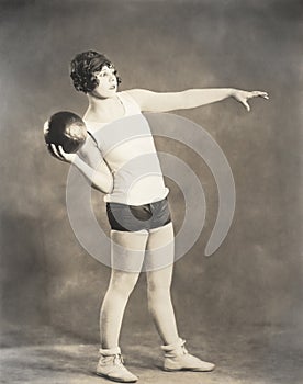 Woman working out with medicine ball